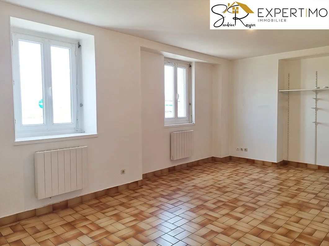 Maison avec deux appartements et dépendances à Saint Eloy-les-Mines 