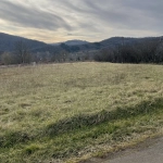 Terrain constructible de 1359 m² à Monteils - Vue dégagée et environnement calme