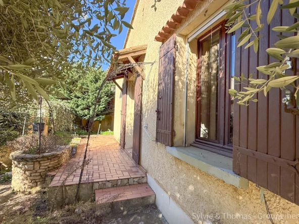 Maison de plain-pied à Orange - 80 m², 2 chambres, jardin, garage et véranda 