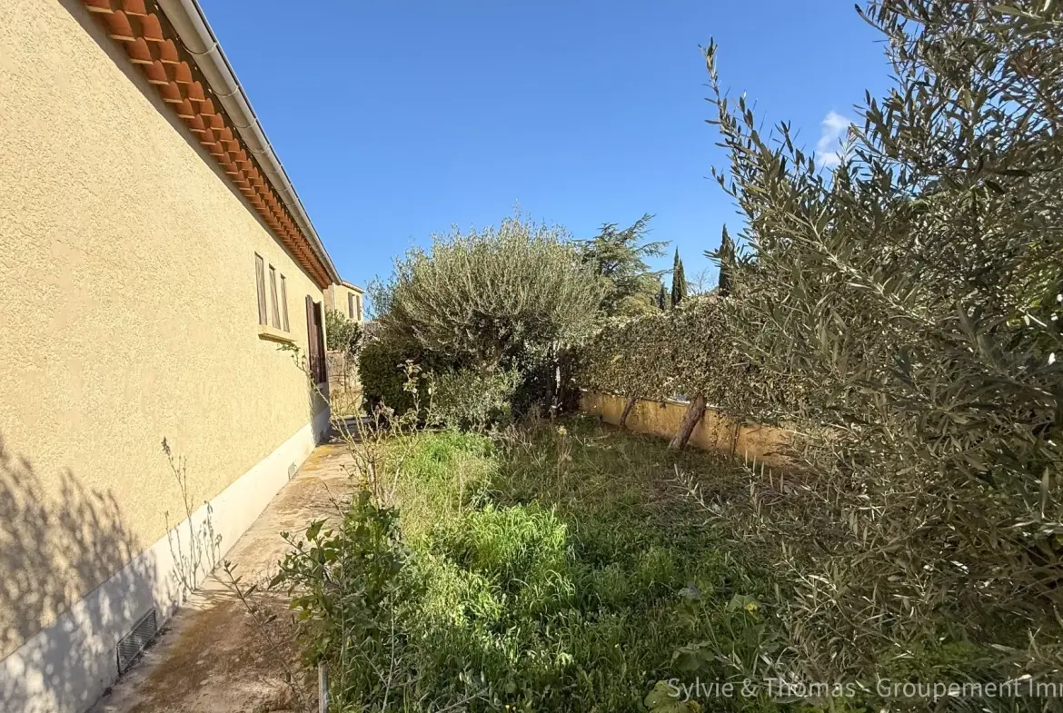 Maison de plain-pied à Orange - 80 m², 2 chambres, jardin, garage et véranda 