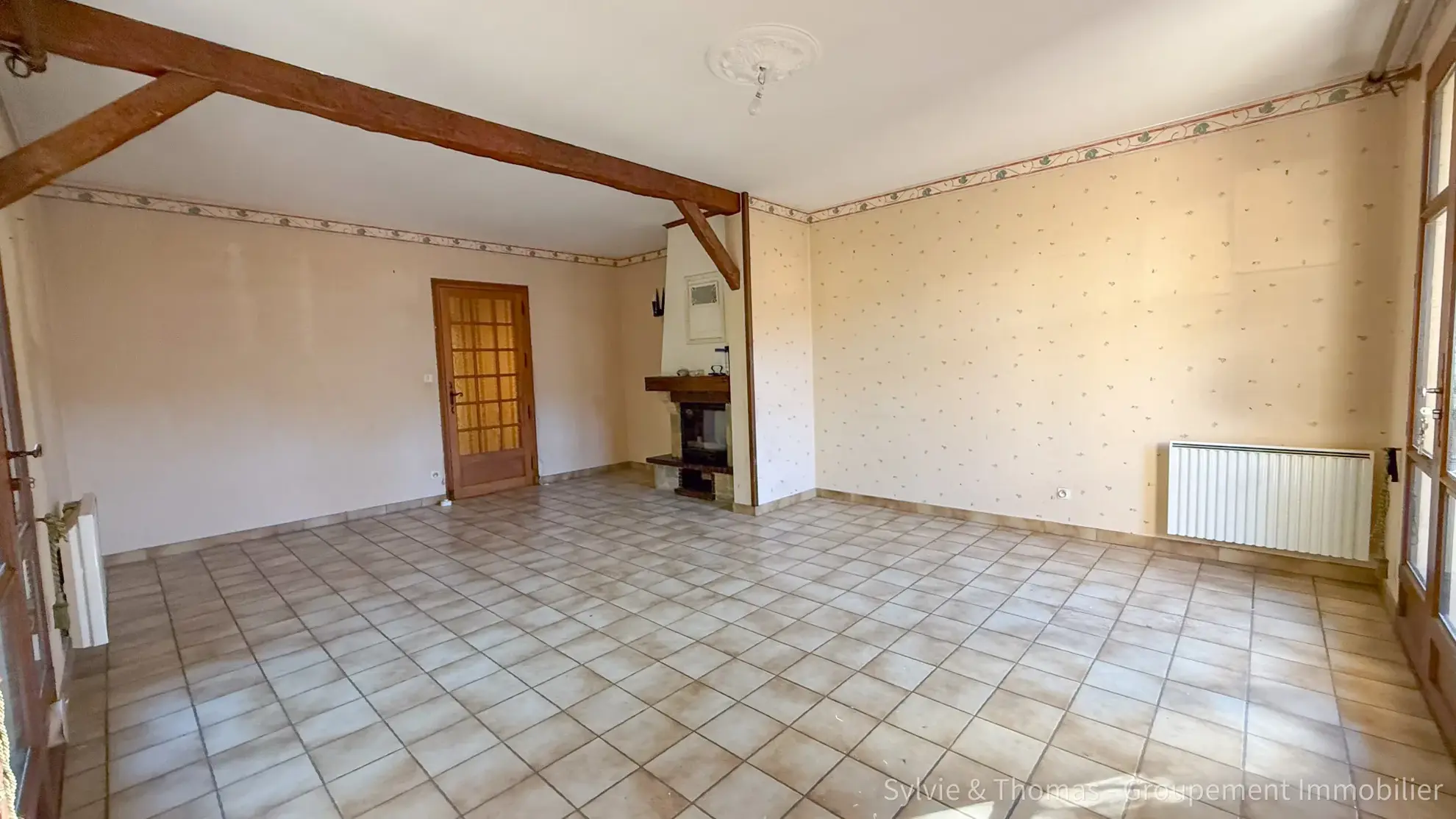 Maison de plain-pied à Orange - 80 m², 2 chambres, jardin, garage et véranda 