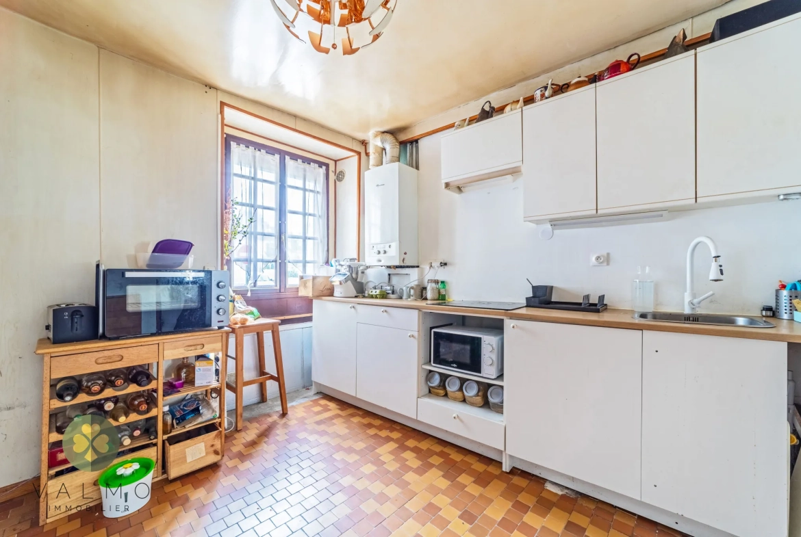 Maison de ville à Maule (78) avec potentiel de rénovation et 4 chambres 