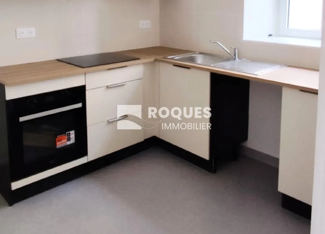 Appartement T3 rénové à Millau avec caves et galetas, situé près de la gare 