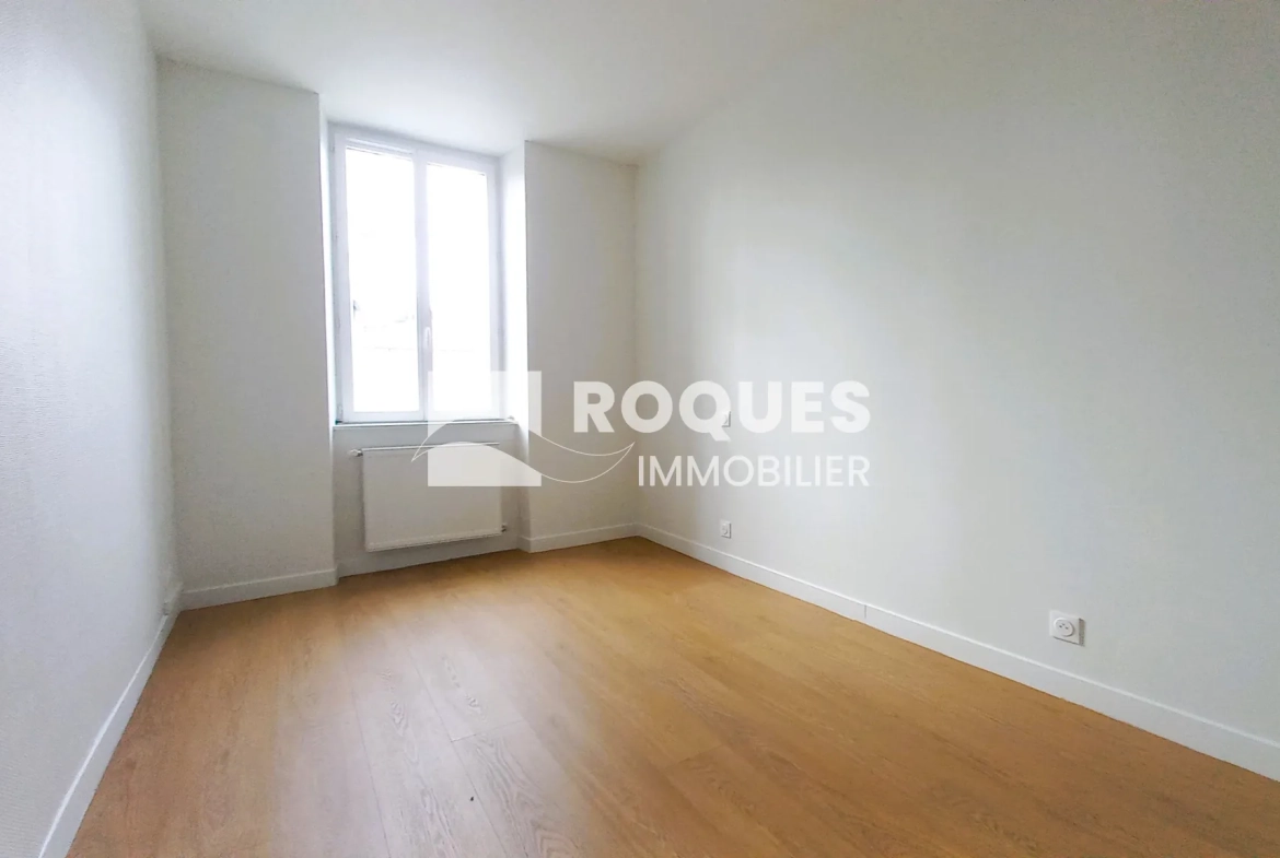 Appartement T3 rénové à Millau avec caves et galetas, situé près de la gare 