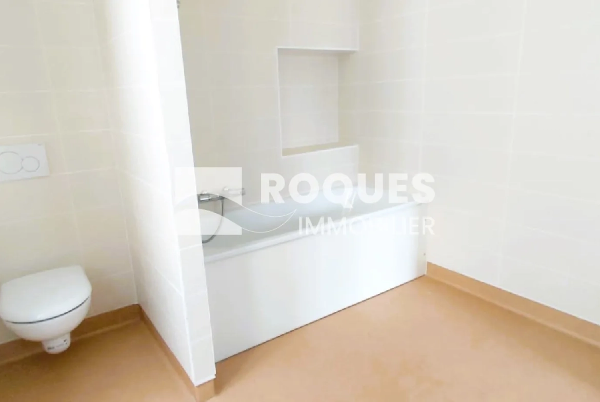 Appartement T3 rénové à Millau avec caves et galetas, situé près de la gare 