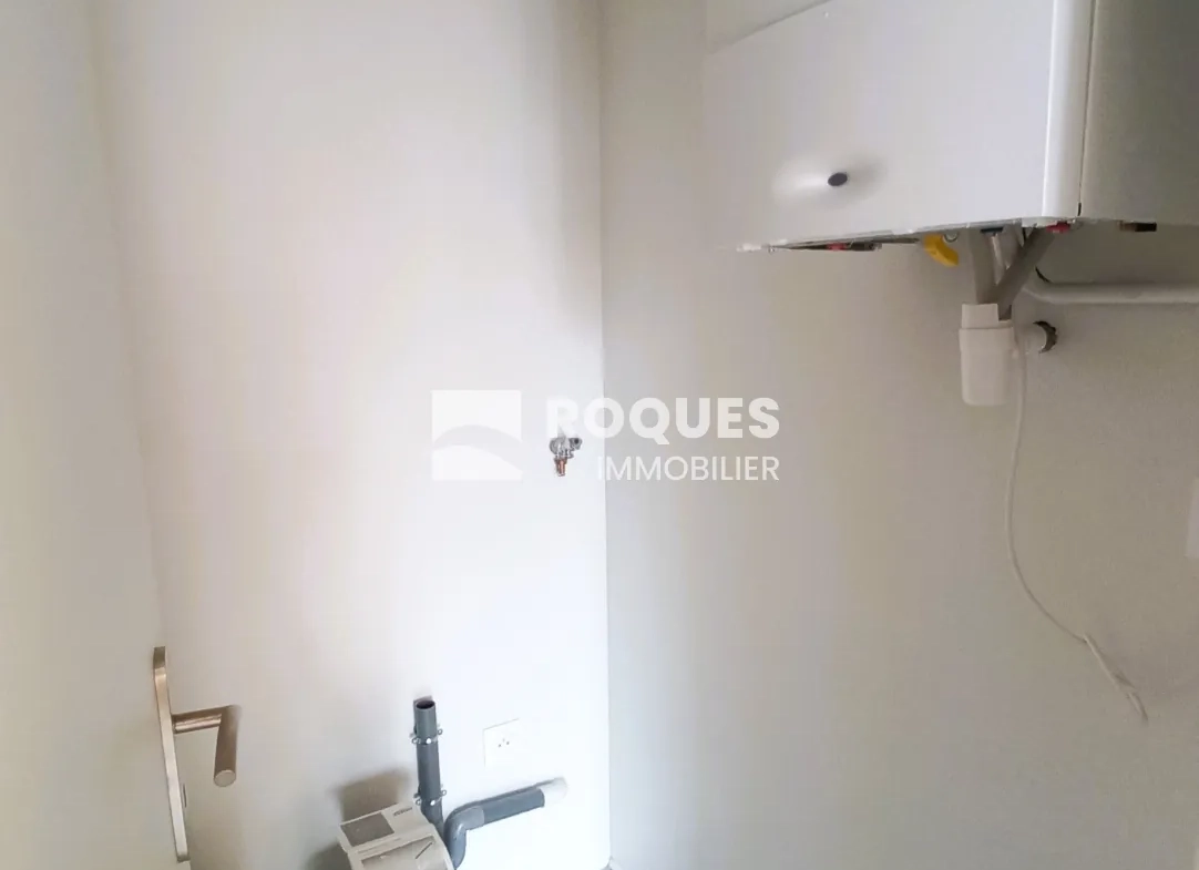 Appartement T3 rénové à Millau avec caves et galetas, situé près de la gare 