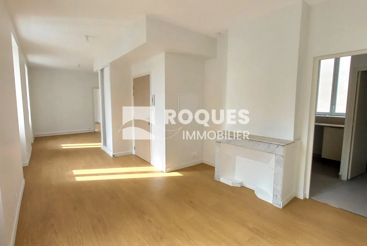 Appartement T3 rénové à Millau avec caves et galetas, situé près de la gare 