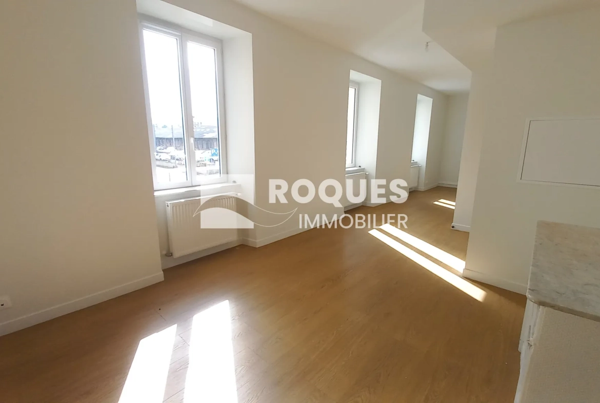 Appartement T3 rénové à Millau avec caves et galetas, situé près de la gare 