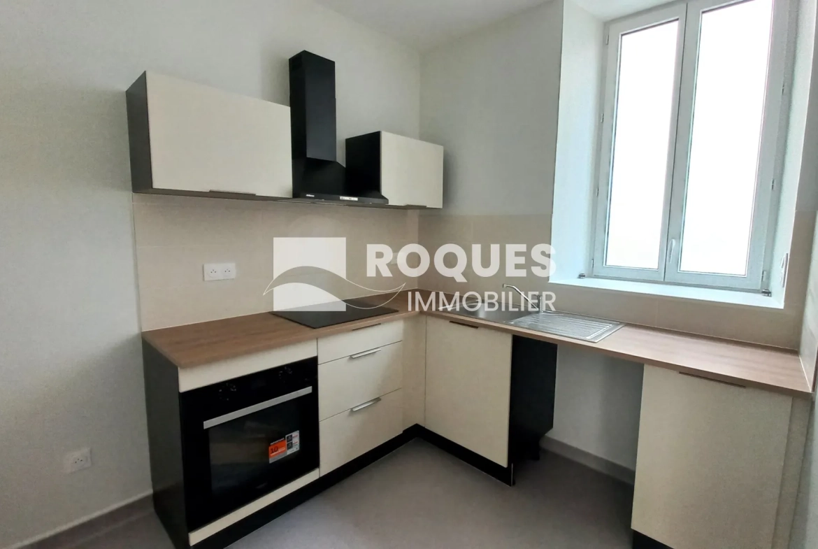 Appartement T3 rénové à Millau avec caves et galetas, situé près de la gare 