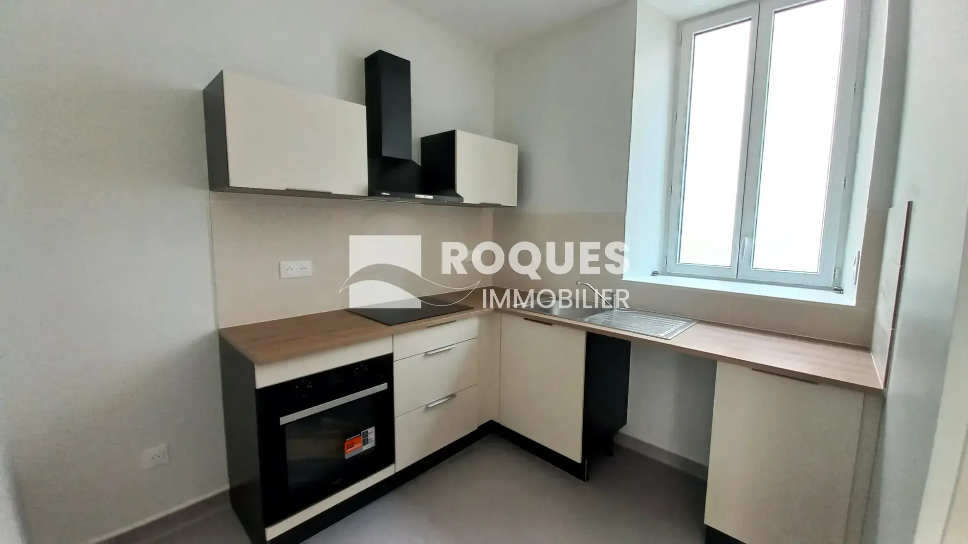 Appartement T3 rénové à Millau avec caves et galetas, situé près de la gare 