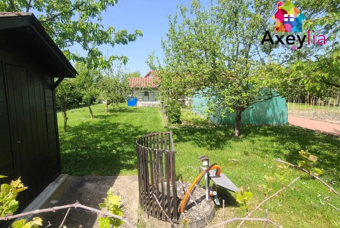Maison 4 chambres avec grand terrain à Saint-Romain-la-Motte, proche Roanne 
