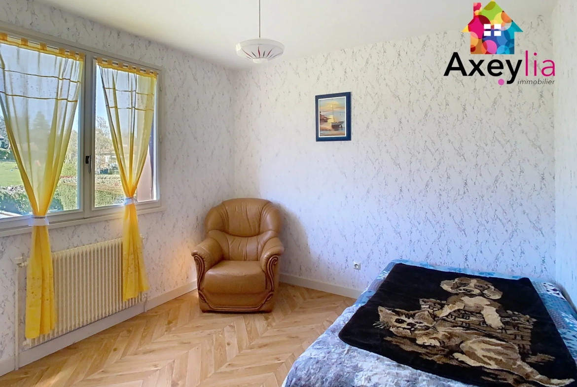 Maison à vendre avec vue dégagée et terrain arboré de 1400 m² à Saint-André d'Apchon 