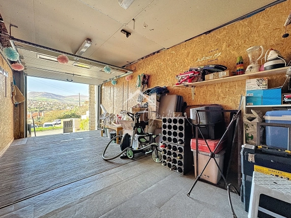 Maison familiale 5 pièces avec vue sur Millau et garage à Creissels 