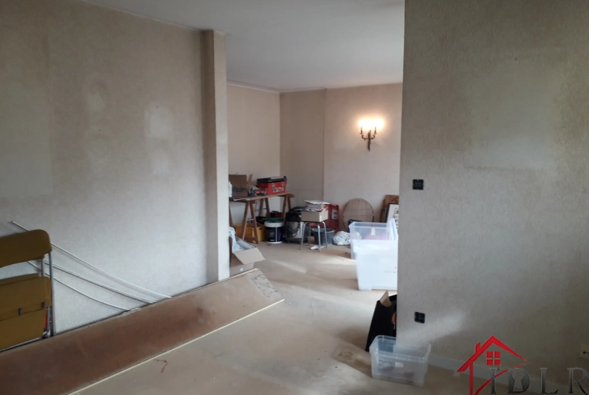 Appartement lumineux de 112 m² à Belfort avec garage et balcon - Secteur calme 