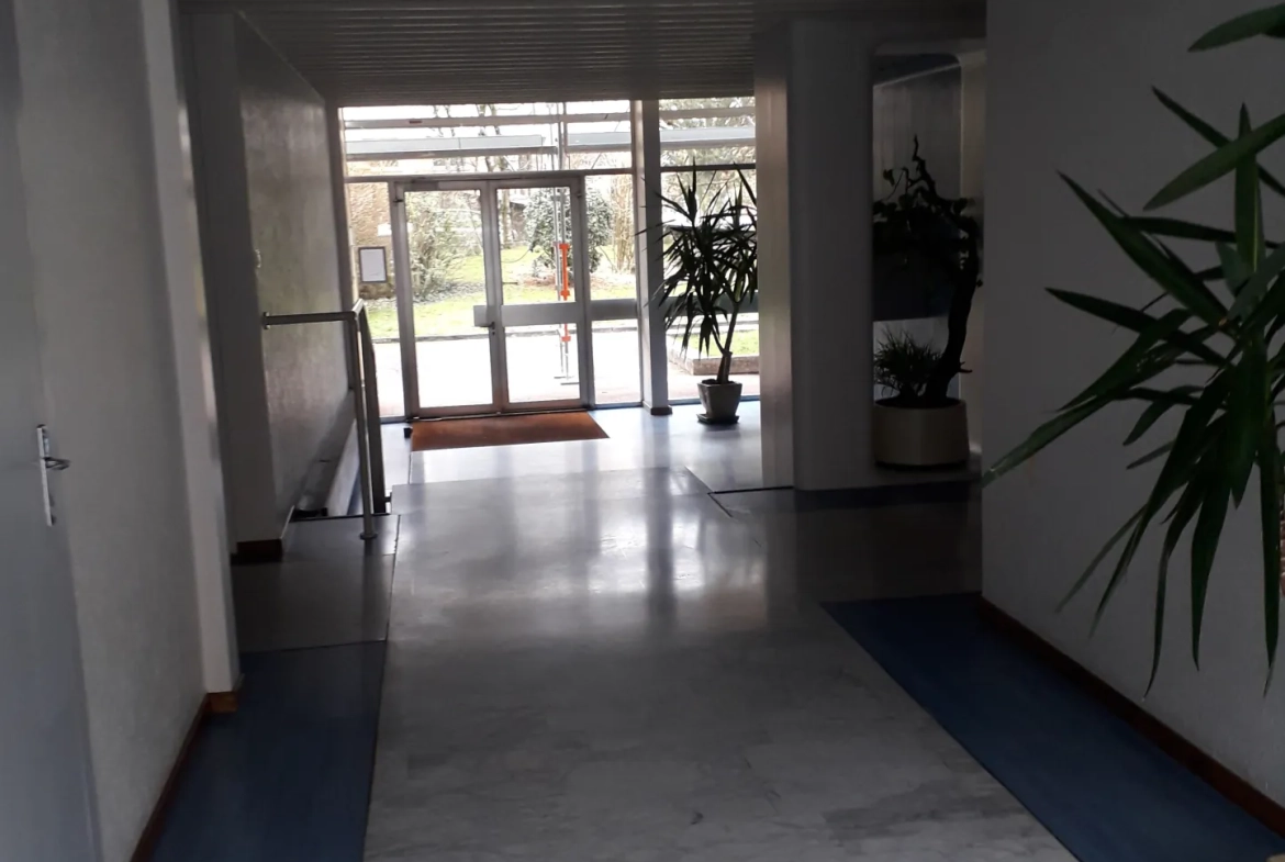 Appartement lumineux de 112 m² à Belfort avec garage et balcon - Secteur calme 