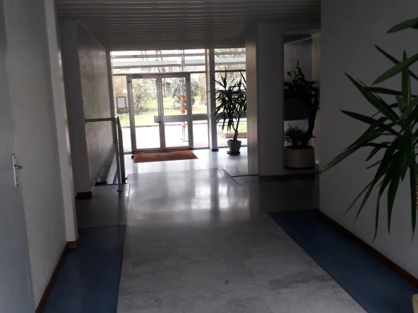 Appartement lumineux de 112 m² à Belfort avec garage et balcon - Secteur calme