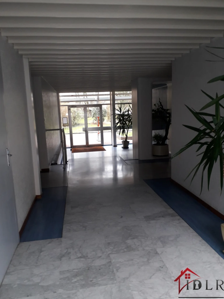 Appartement lumineux de 112 m² à Belfort avec garage et balcon - Secteur calme