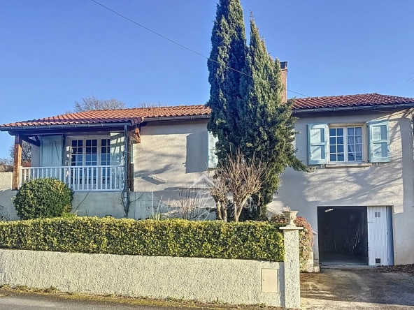 Maison lumineuse T4 avec garage et vue dégagée à Saint-Rome-de-Cernon