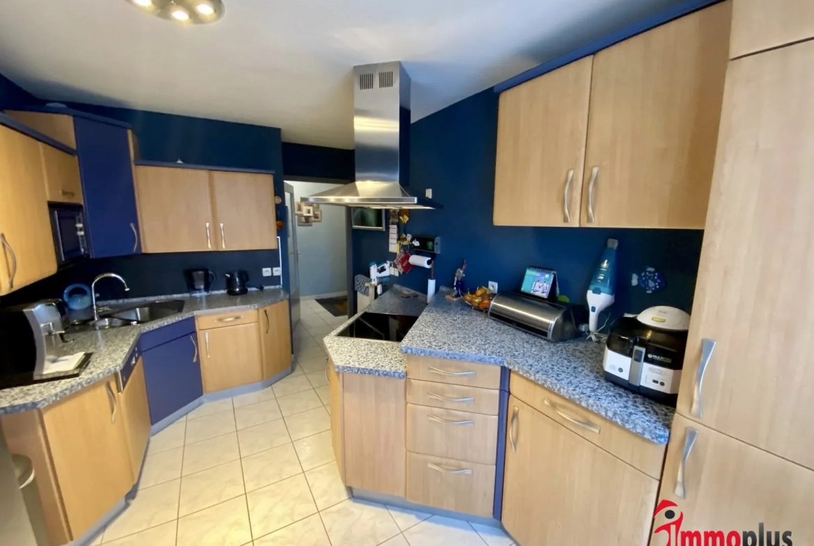 Appartement lumineux de 114m² avec terrasse et garage à Bartenheim 