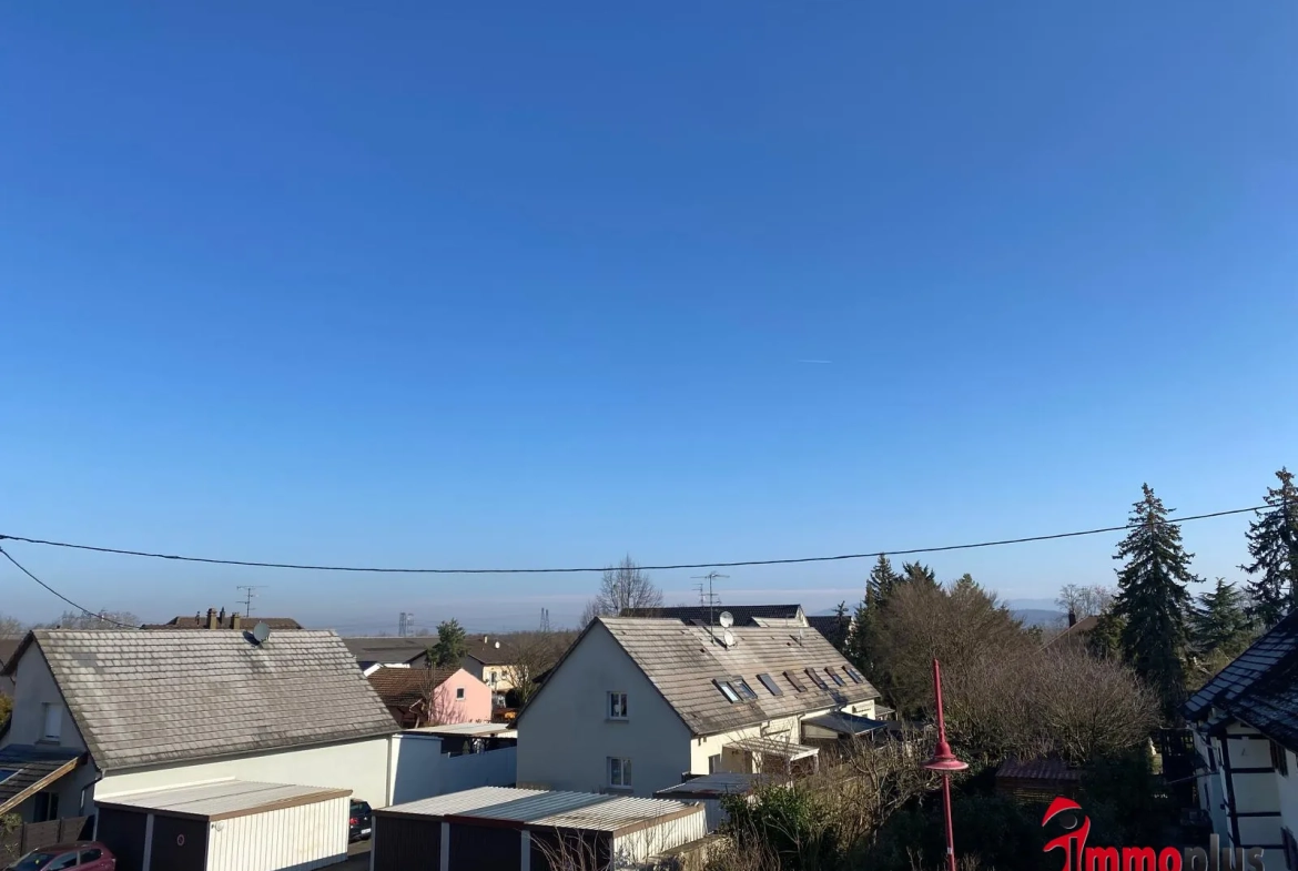 Appartement lumineux de 114m² avec terrasse et garage à Bartenheim 