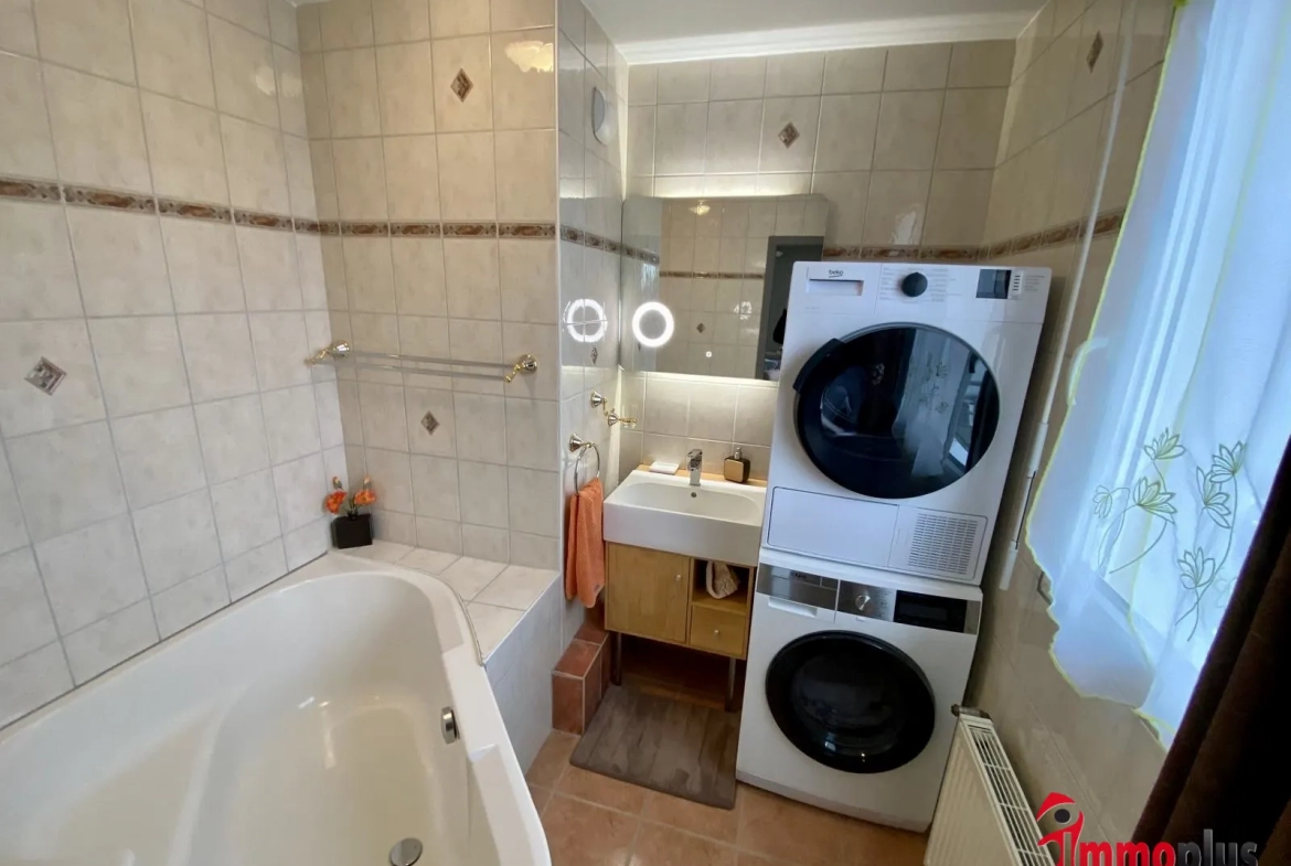 Appartement lumineux de 114m² avec terrasse et garage à Bartenheim 