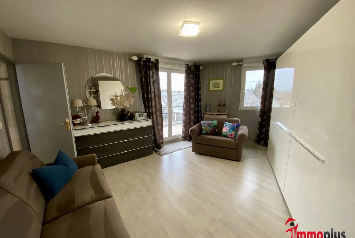 Appartement lumineux de 114m² avec terrasse et garage à Bartenheim 