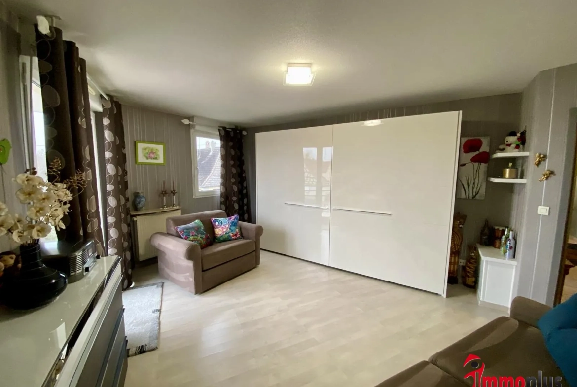 Appartement lumineux de 114m² avec terrasse et garage à Bartenheim 