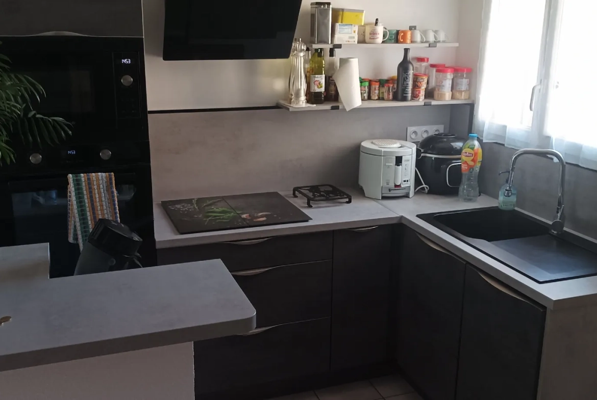 Appartement 3 pièces avec jardin privatif et garage à Perpignan 
