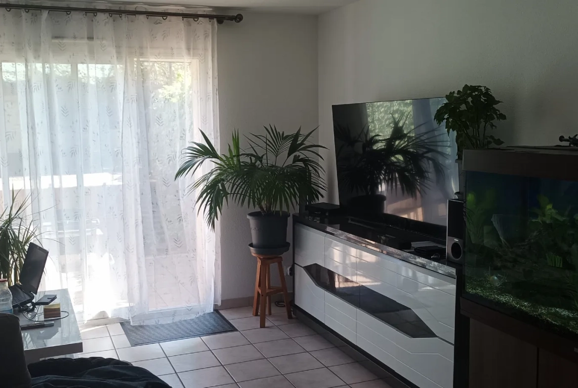 Appartement 3 pièces avec jardin privatif et garage à Perpignan 