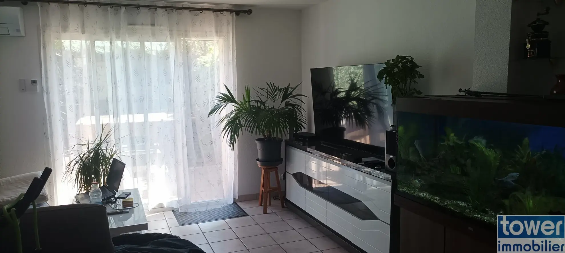 Appartement 3 pièces avec jardin privatif et garage à Perpignan 