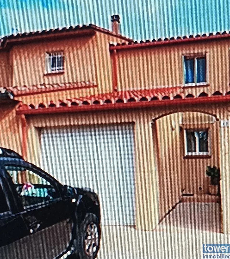 Appartement 3 pièces avec jardin privatif et garage à Perpignan 