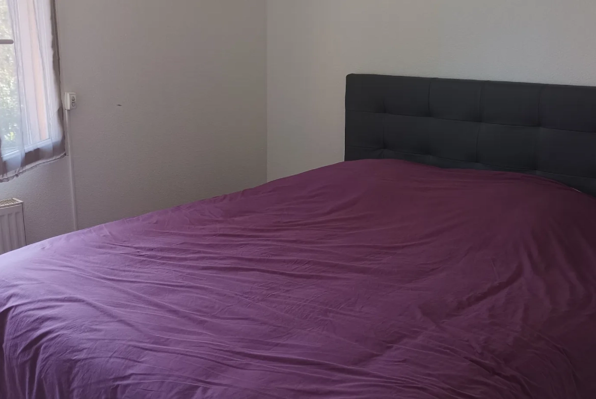 Appartement 3 pièces avec jardin privatif et garage à Perpignan 