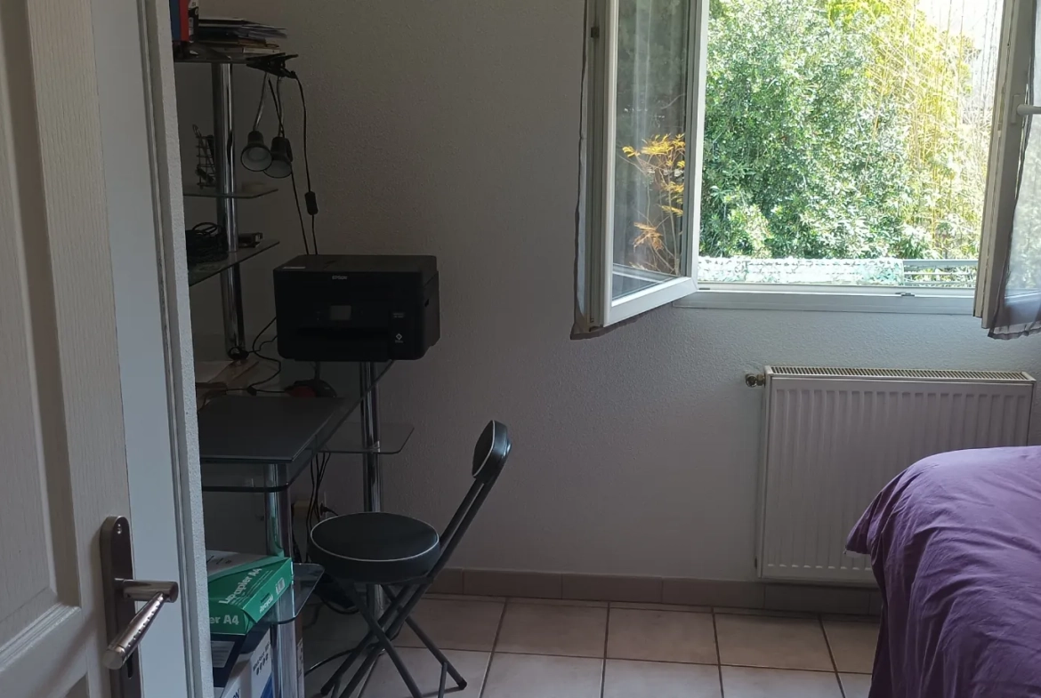 Appartement 3 pièces avec jardin privatif et garage à Perpignan 