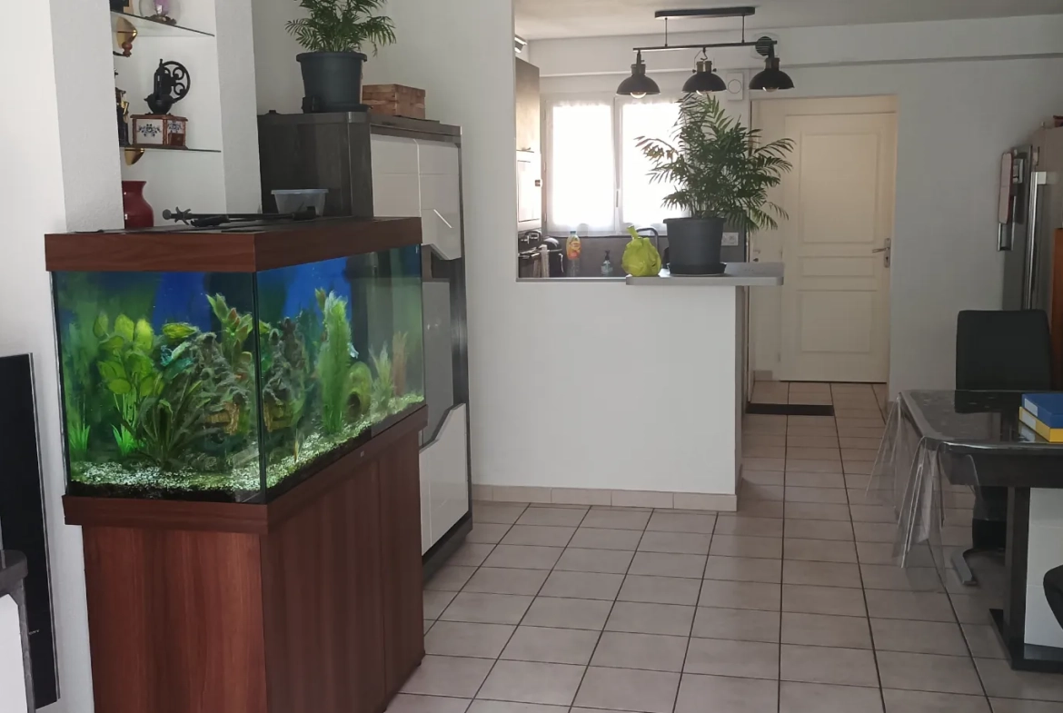 Appartement 3 pièces avec jardin privatif et garage à Perpignan 