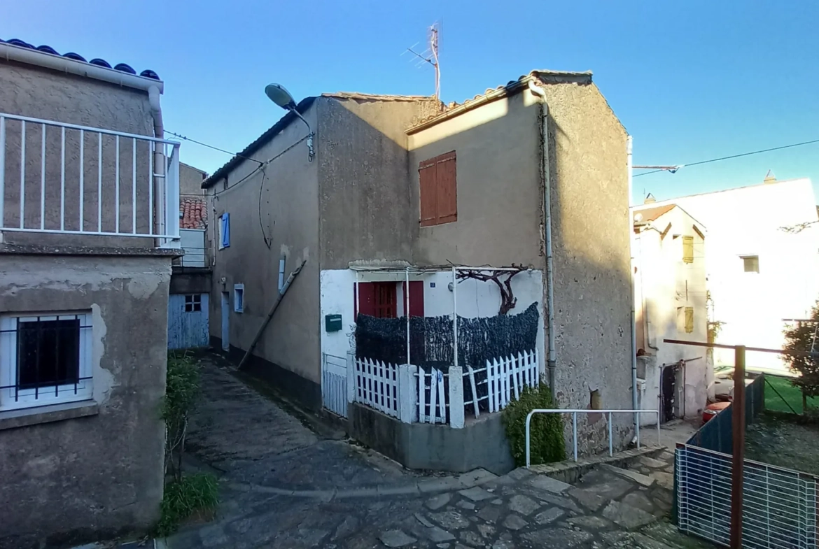 Maison de village avec deux habitations, terrasse et jardin à Le Bousquet d'Orb 
