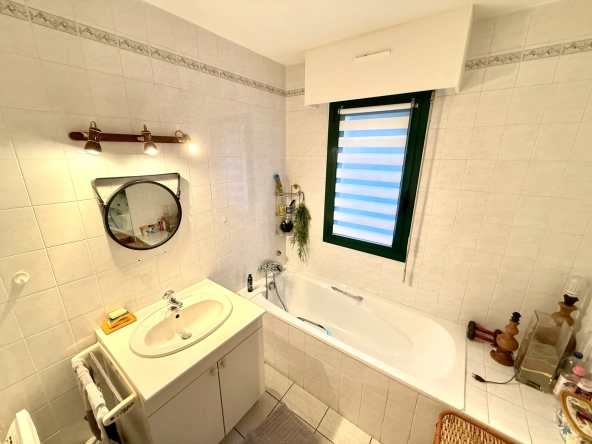 Appartement T3/T4 de 83 m² avec terrasse et cave au centre de Perpignan 