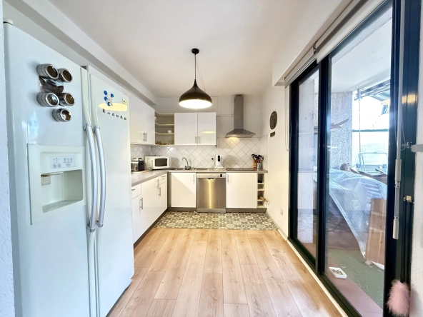 Appartement T3/T4 de 83 m² avec terrasse et cave au centre de Perpignan 