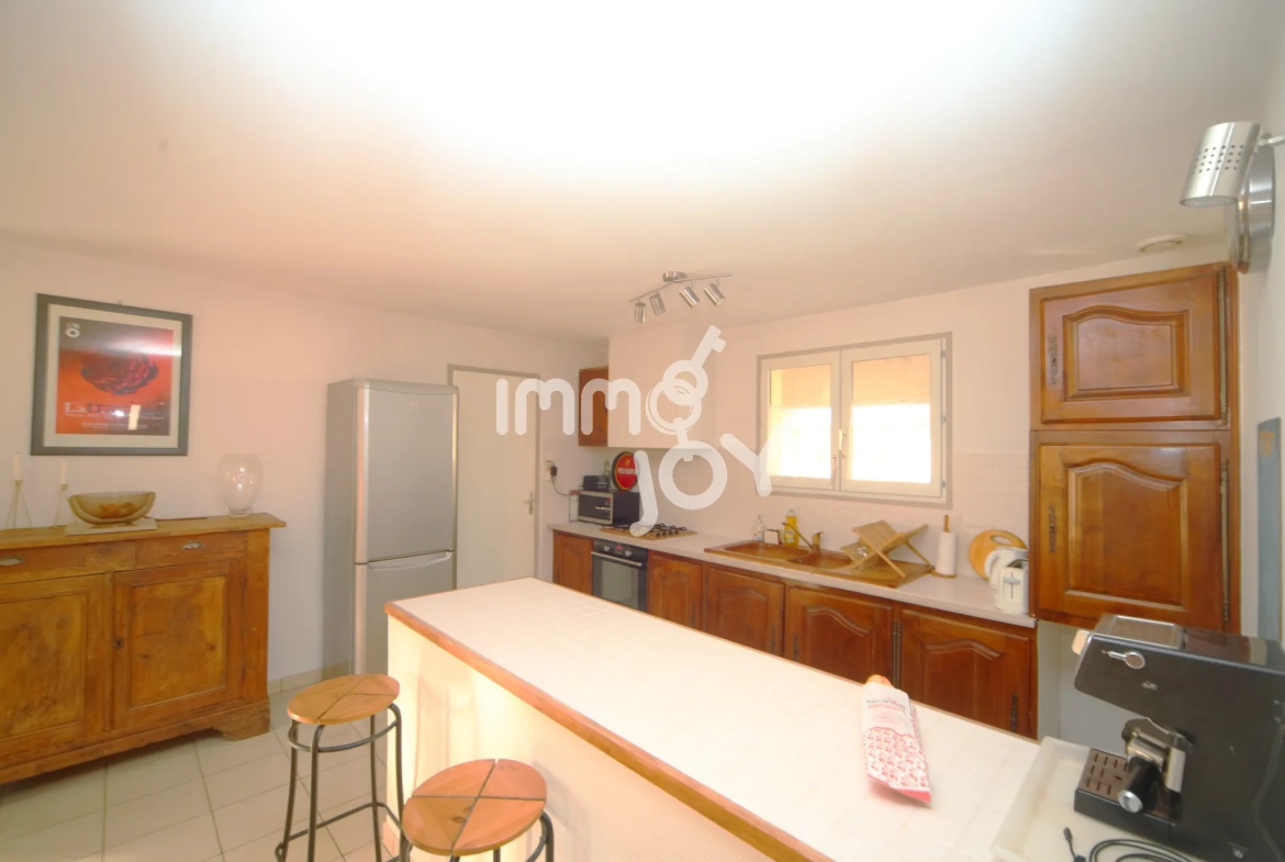 Ensemble immobilier avec maison et local d'activités à Grazac, proche Toulouse 