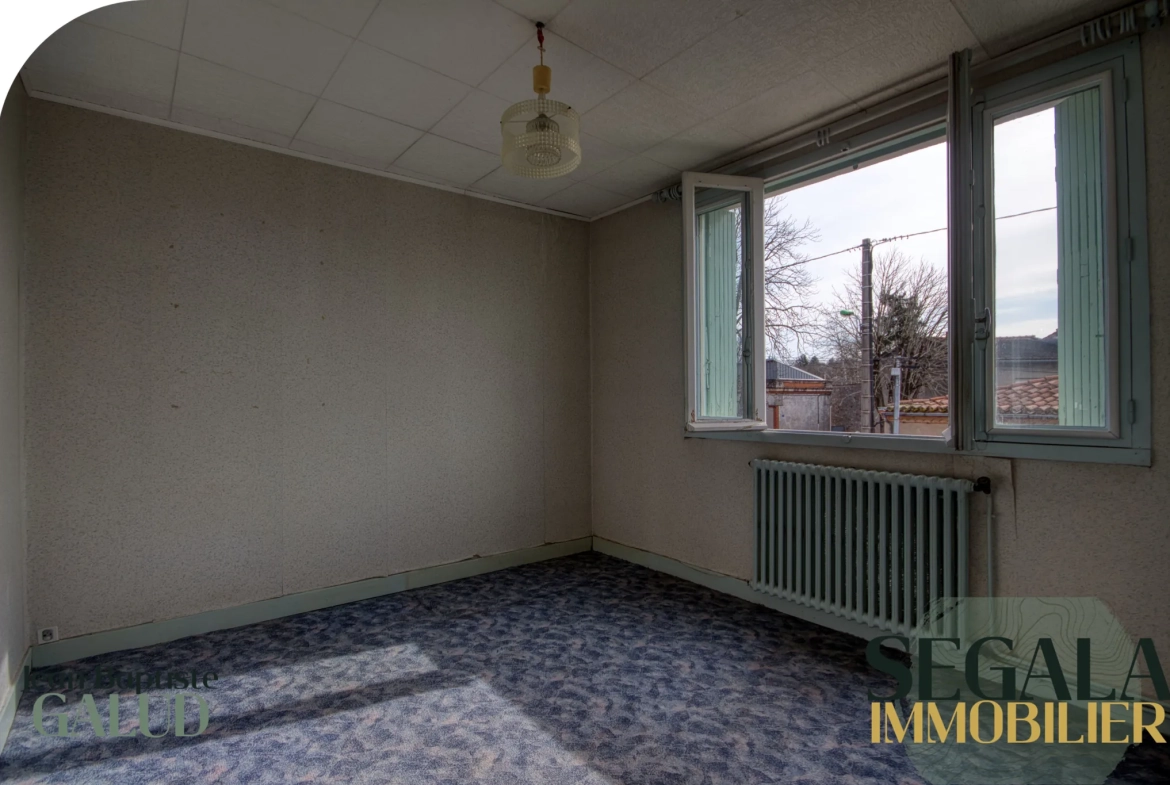 Maison à vendre à Carmaux - Quartier Sainte Cécile avec jardin et garage 