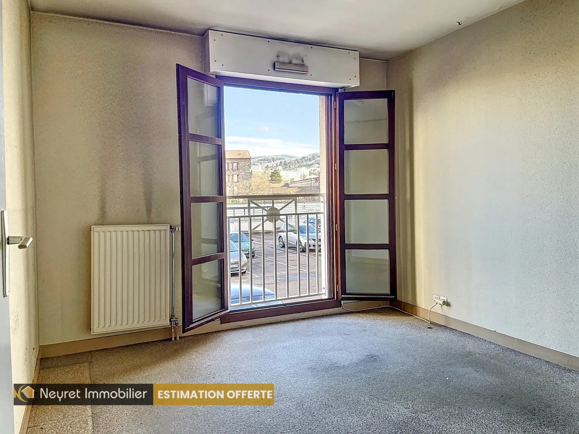 Ensemble de 3 appartements à Saint-Étienne Centre avec garages et jardin à rénover 