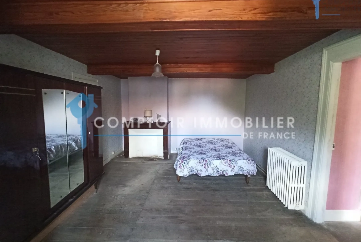 Maison en pierre de 130 m² avec grange et garage à Bertren - Vue dégagée 
