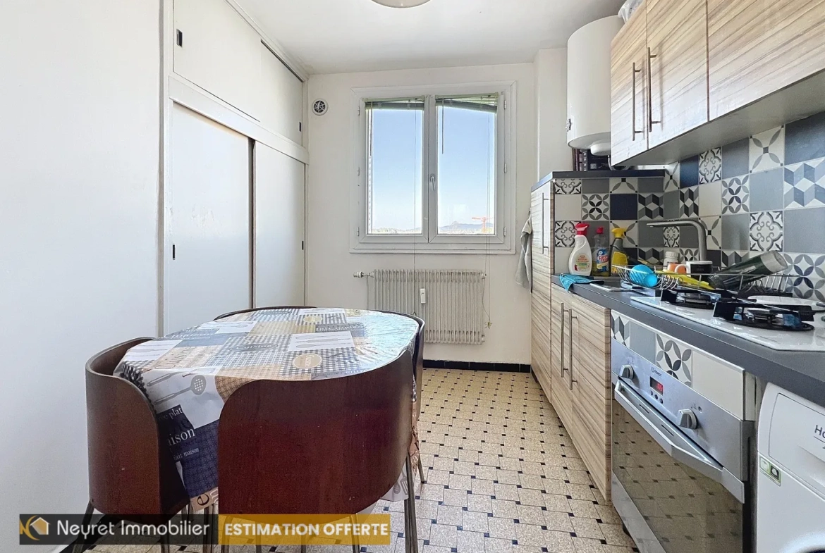 Appartement T3 à Oullins Pierre Benite avec balcon, parking et cave 