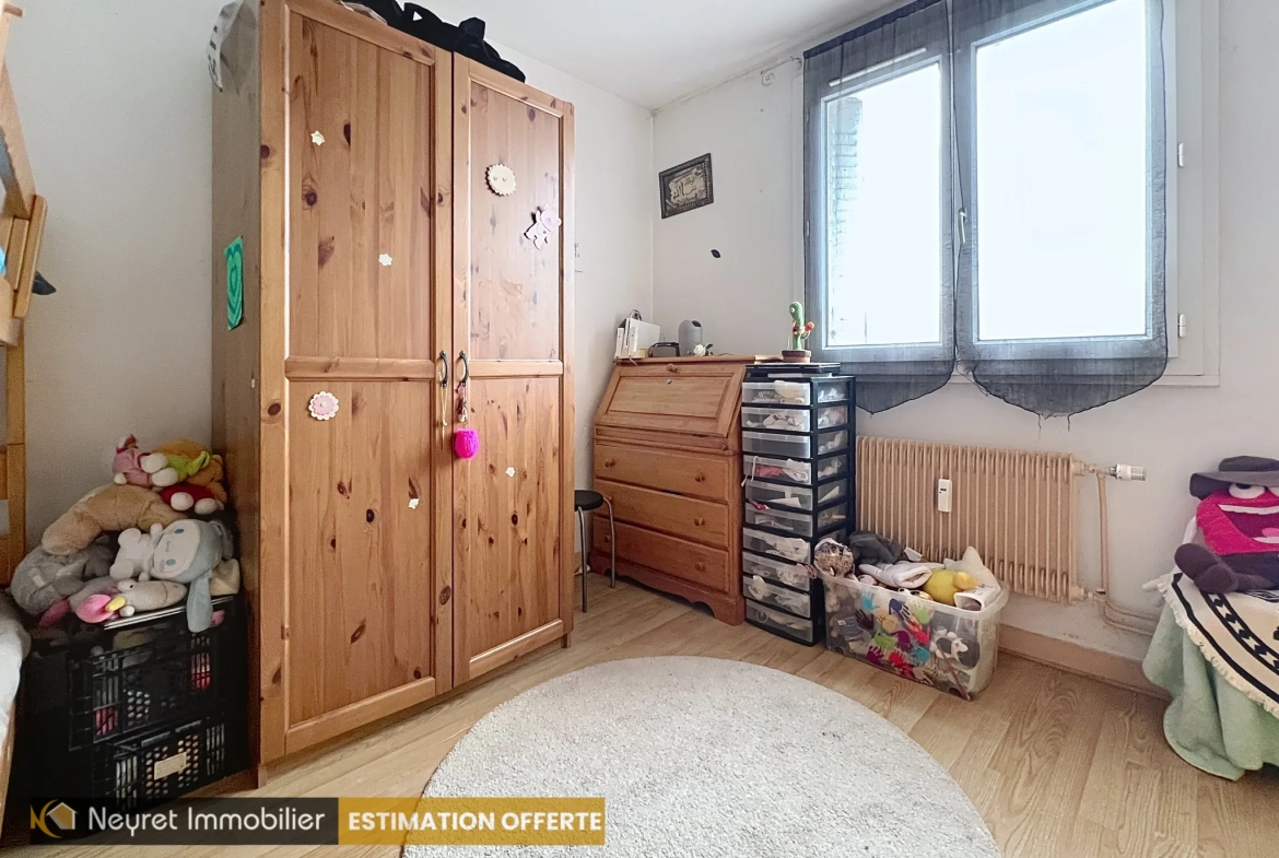 Appartement T3 à Oullins Pierre Benite avec balcon, parking et cave 