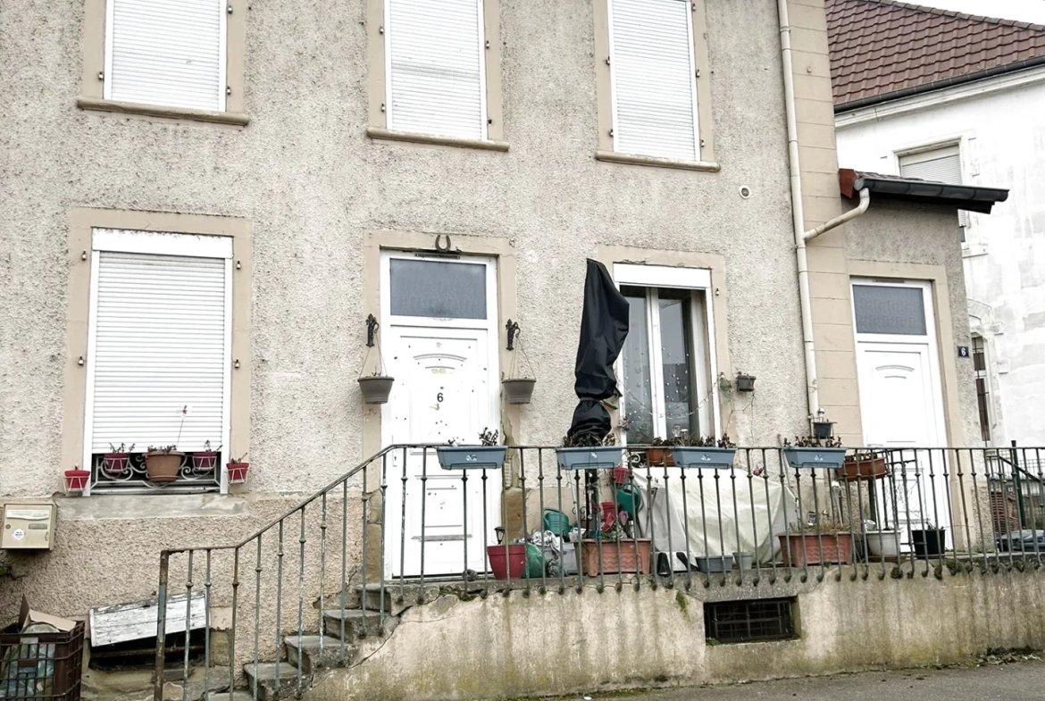 Investissement immobilier à Remilly - Immeuble de 4 logements loués 