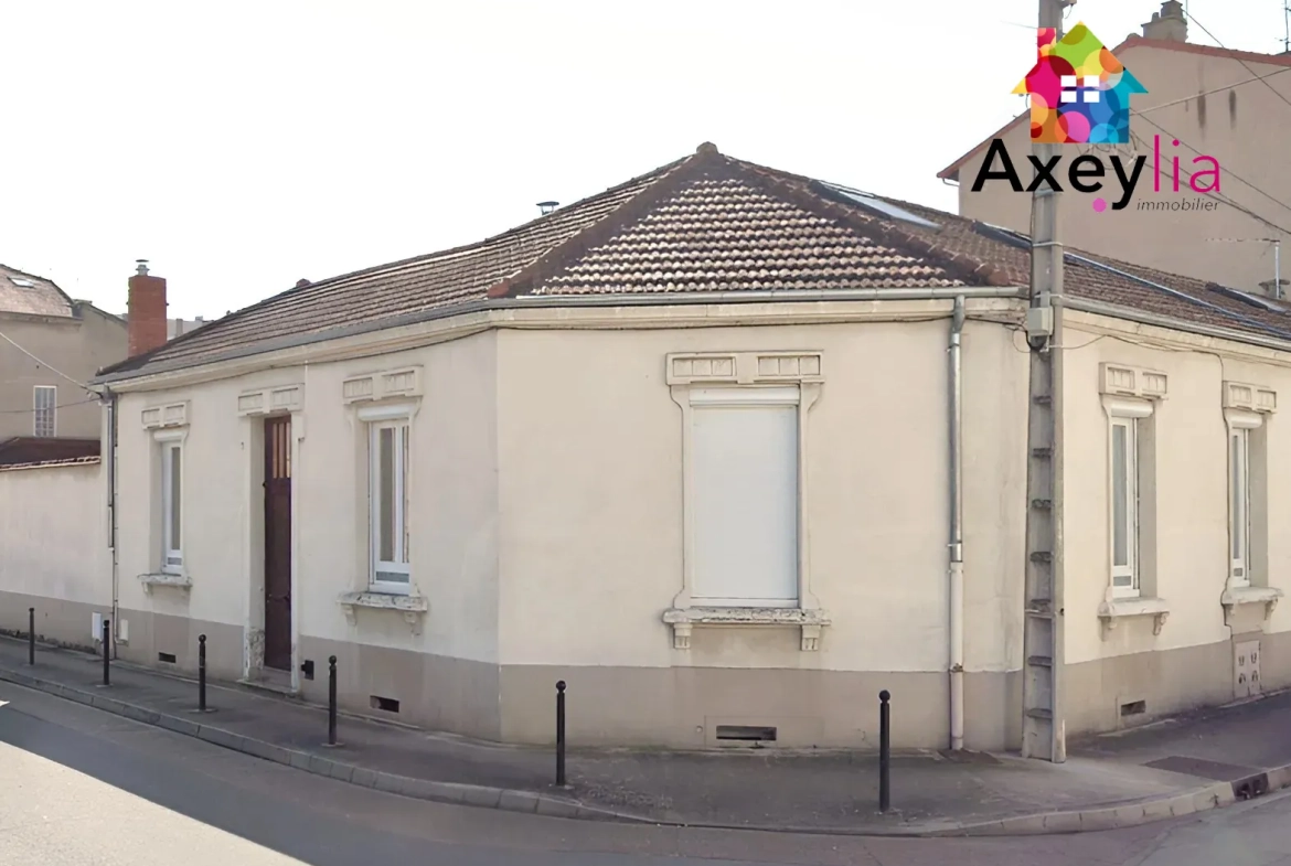 Maison familiale à Roanne avec 4 chambres, jardin et garage proche gare 