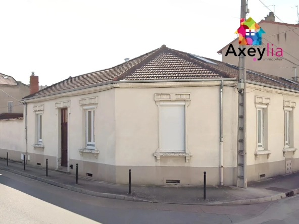 Maison familiale à Roanne avec 4 chambres, jardin et garage proche gare