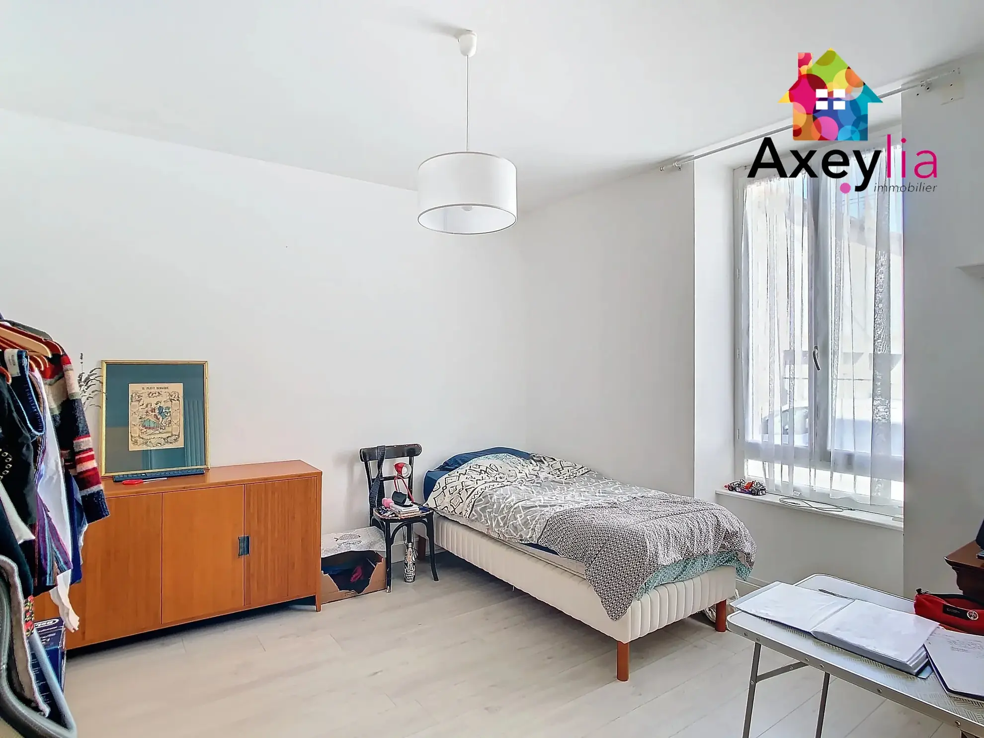 Maison familiale à Roanne avec 4 chambres, jardin et garage proche gare 
