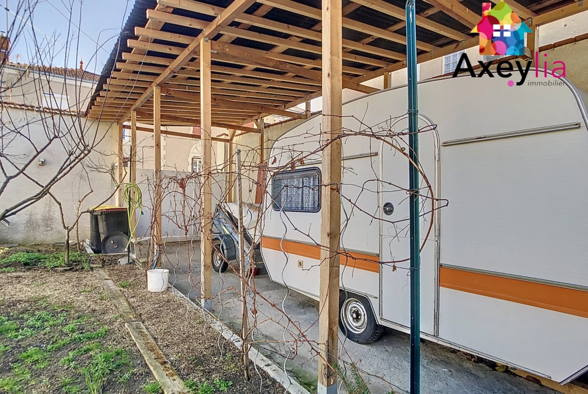 Maison familiale à Roanne avec 4 chambres, jardin et garage proche gare 