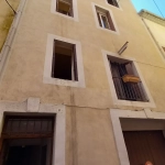 Immeuble à vendre à Bedarieux avec 3 appartements et garage, bon rapport locatif