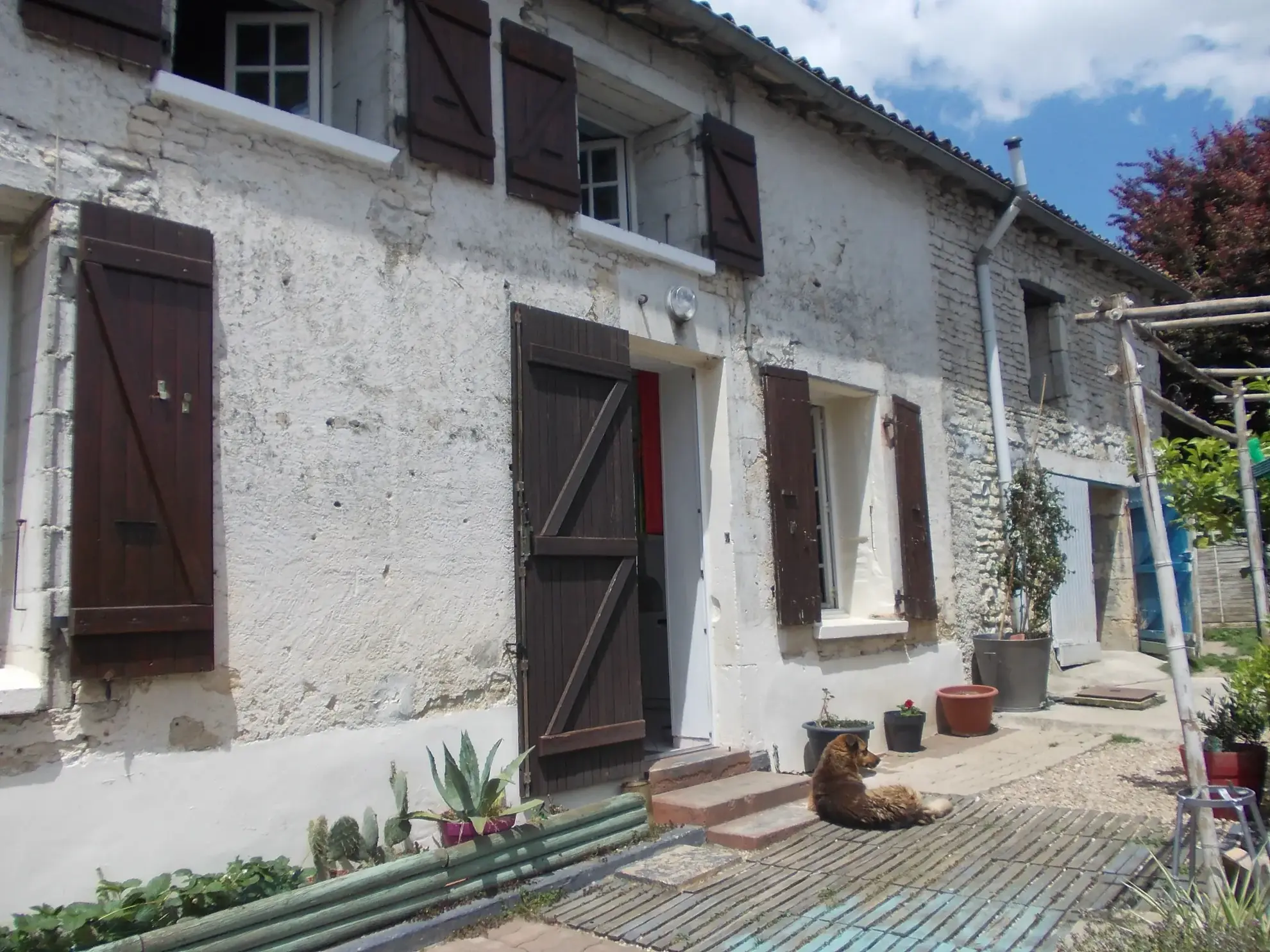 Maison de village rénovée avec garage à Matha - 117 m² 
